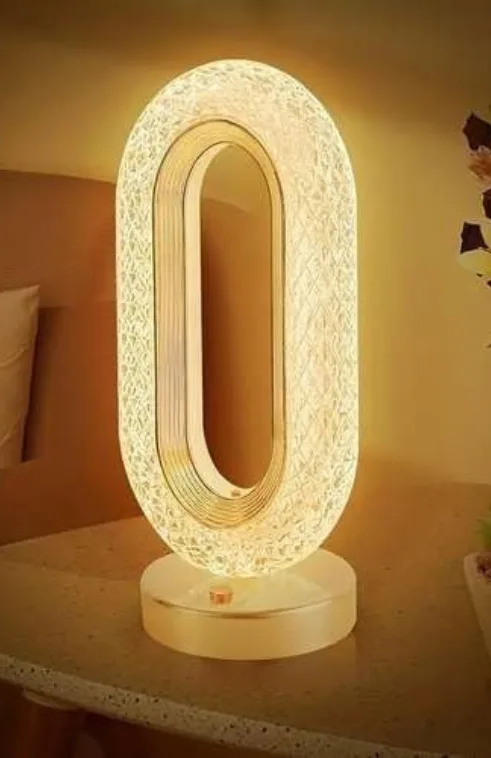 Decorative LED table lamp with oval design